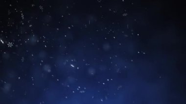 Birçok beyaz kar taneleri koyu mavi bir zemine düşüyor. Yüksek kaliteli FullHD görüntüler
