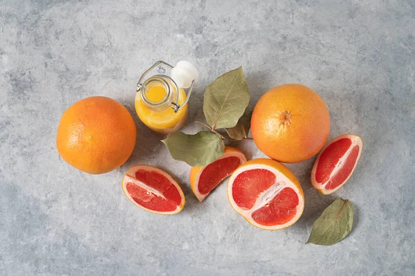 Layout Juicy Red Grapefruits Juice Bottle Blue Background Concept Healthy — Stock Photo, Image