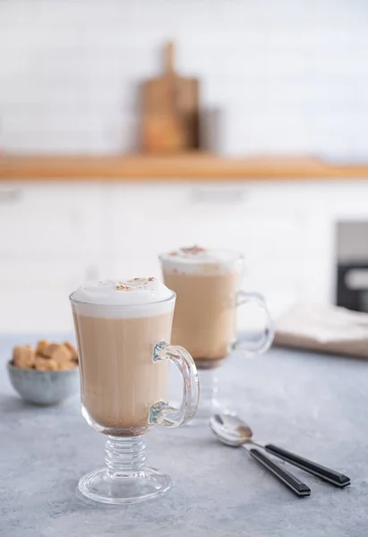 Two Glasses Fragrant Cappuccino Coffee Cinnamon Blue Table Background White — Foto Stock