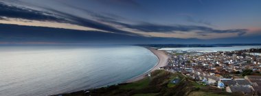 Chesil beach at sunset clipart