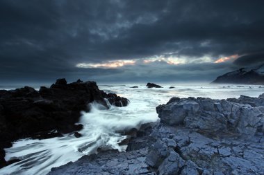 Stormy sea in south east iceland clipart