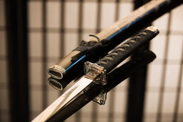 Katana with sheath reversed laying on table — Stock Photo, Image