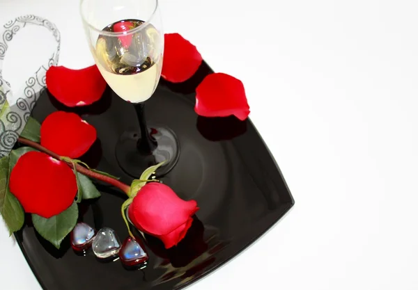 Red rose with glass of wine — Stock Photo, Image