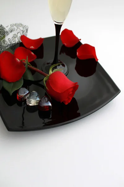 Beautiful red rose and glass of wine — Stock Photo, Image