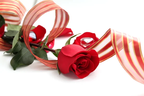 Romantic red rose and ribbon — Stock Photo, Image