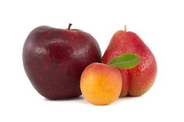 Whole ripe red apple, apricots and pear isolated on a white background