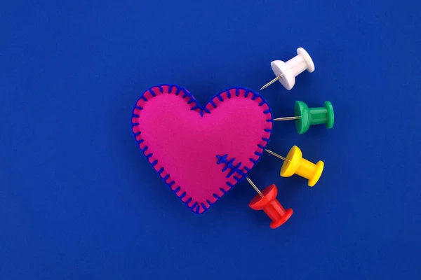 Heart Pain Medical Concept Multicolor Push Pins Stuck Felt Heart — стоковое фото