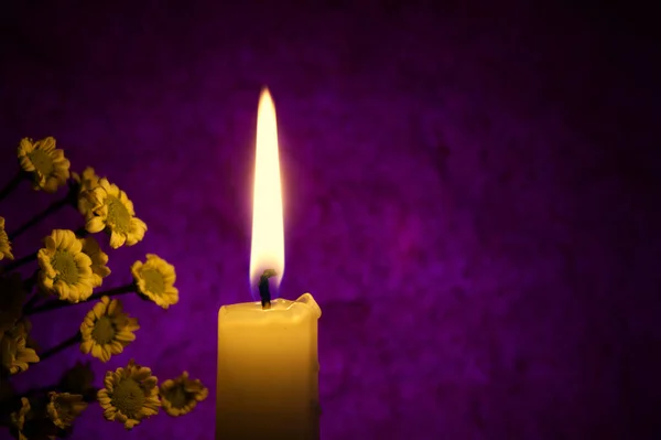 Close Orange Wax Candle Flame Flowers Illuminated Candlelight Dark Red — Stock fotografie