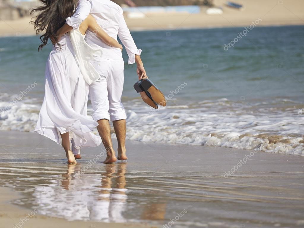 Lovers on beach — Stock Photo © allensima 42763149