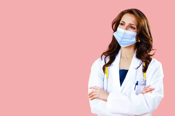 Portrait Female Doctor Nurse Medical Mask Crossed Arms Pink Studio — Stock Photo, Image