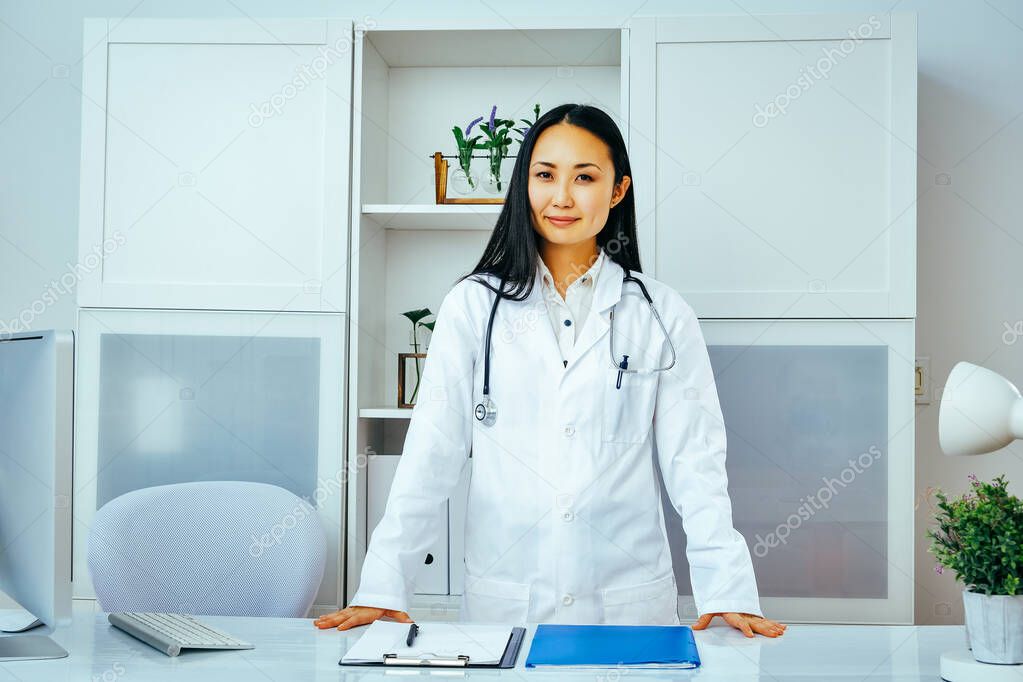 portrait of smiling female doctor with stethoscope 