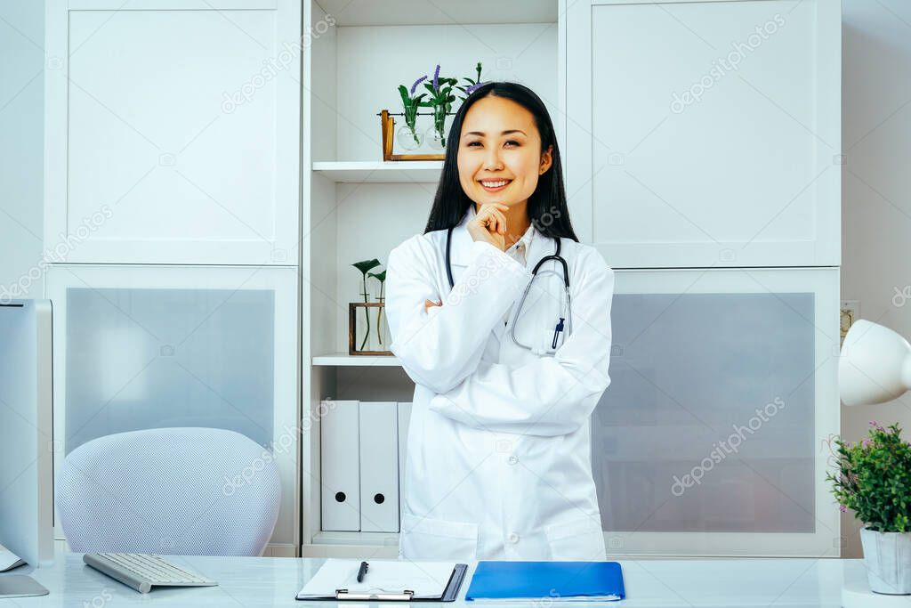 portrait of smiling female doctor in the office.