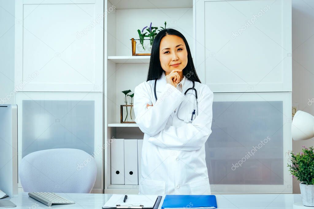 portrait of Asian female doctor in a medical office.