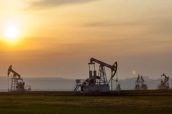 Oil rocking spring — Stock Photo, Image