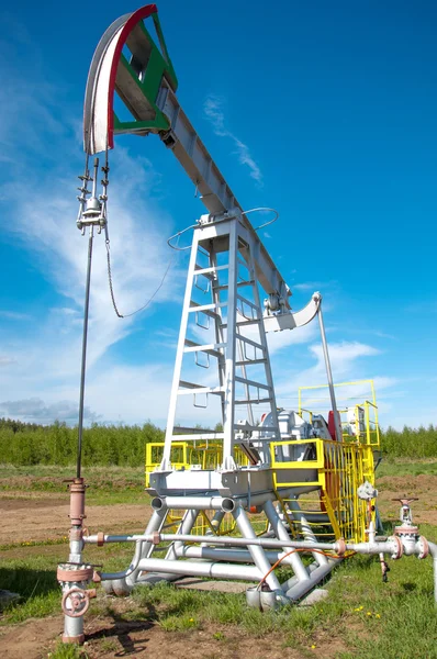 Oil pump jack in operation — Stock Photo, Image