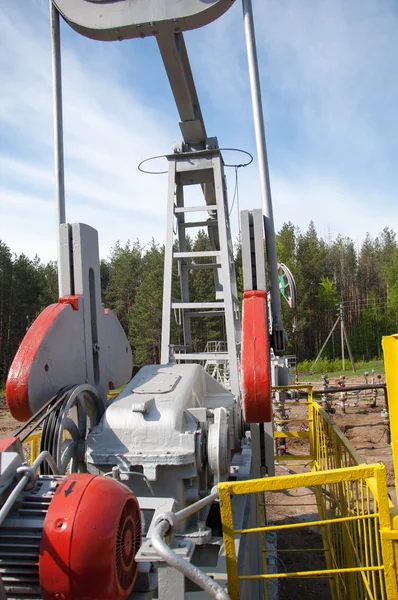 Oil pump jack in operation — Stock Photo, Image