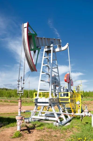 Oil pump jack in operation — Stock Photo, Image