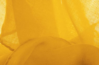 Sarı ince taneli doku. Sarı ipek keçeli kadife kumaş. Doku arka planı. Arkaplan kumaşı