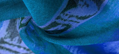 Kumaştaki soyut desen, büyük örgülü bir iplik, mavi beyaz çizgiler, projeleriniz için bu kumaş. Doku, arkaplan