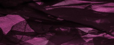 Doku. Arka plan kırmızı bordo ipek kumaş, üst manzara. Kırmızı ipeğin ya da satenin pürüzsüz dokusu, kopyalama alanı olan soyut bir arkaplan olarak kullanılabilir.