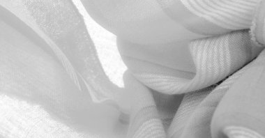 Tek renkli gri ipek kumaş, doku. Geçmişi. bir fotoğraf ya da resim siyah beyaz ya da sadece tek bir renkte farklı tonlarda geliştirildi ya da çalıştırıldı.