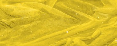 Renk simli şeffaf sarı kumaş, klasik ve modern tasarım kütüphanesiyle tanınıyor. doku, arkaplan