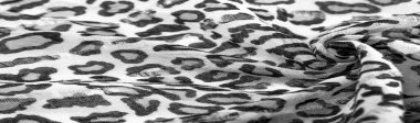 İpek kumaştan siyah beyaz leopar desenli. Leopar desenli hafif ipek senin tasarımına mükemmel uyacak, şık görünüyor ve kaba değil! Doku, arkaplan, desen