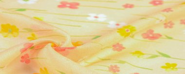 Doku arka planı, ipek kumaş, bej arka planda küçük çiçekler, ince dikiş. Kırmızı, bej renkli ton. Çiçek tasarımı