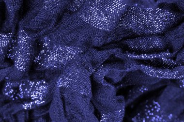 Doku. Koyu mavi kumaş. Noel kadınsı kraliyet partisi için dekoratif bir altyapı. Şatafatlı, deri desenli duvar kağıdı desenli. Doğum günü davetiyeleri için arka plan. Açık pastel renk