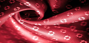 Kırmızı yakuttan yapılmış ipek kumaş, küçük kare desenli eşkenler. Tasarımında zenginlik ve lüks. Arkaplan dokusu, dekoratif süs