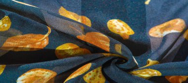 İpek kumaş, mavi ve sarı sonbahar yaprakları. Doku, arkaplan deseni