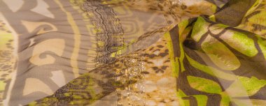 ipek kumaş, yeşil-kahverengi, soyut arka plan kumaşı veya sıvı dalga veya grunge ipek kumaş kıvrımlı kadife kumaş veya lüks Noel arkaplanı veya zarif duvar kağıdı tasarımı