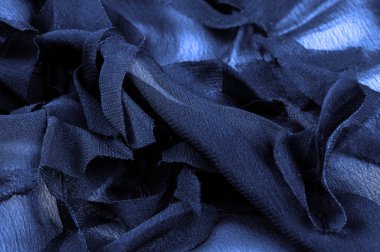 Doku. Geçmişi. Mavi ipek kumaş, üst manzara. Pürüzsüz mavi ipek ya da saten kumaş dokusu, kopyalama alanı olan soyut bir arkaplan olarak kullanılabilir.