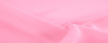 İpek kırmızı polyester. Pembe ipek kumaşın arka planı. Şeffaf arkaplan ve elbise dikmek için açık kumaştan yapılmış. Tekstil panoraması. Dokuma. şablon.