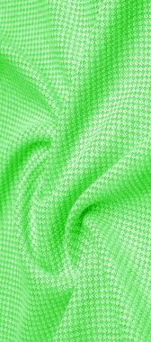 Yün kumaşın rengi yeşil, süper yumuşak ve pofuduk eli açık bir desen. Arkaplan dokusu