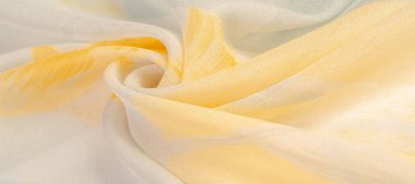 İpek kumaş, beyaz arka planda sarı çiçekler. Pastel renkli bu hassas kumaş güverte ve süslemeleri çağrıştıracak. Doku, arkaplan deseni,