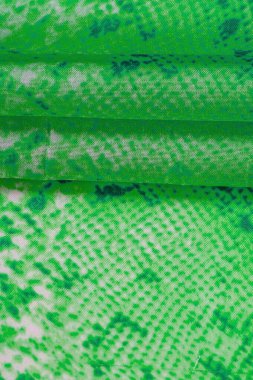 Yılan derisi desenli yeşil kumaş, parlak yeşil kumaşın arka plan dokusu yakın. arkaplan, doku, desen