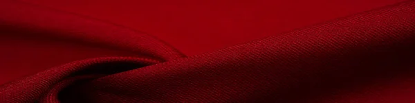 red silk fabric, this is silk satin weaving. Differs in density, smoothness and gloss of the front side, softness, Texture, background