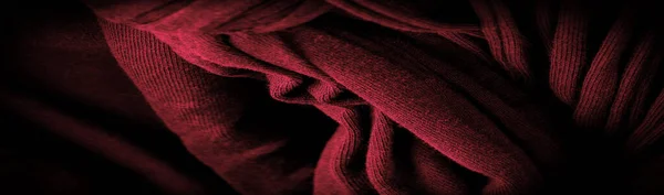 红色辫子的织物 针织背景 花纹斑纹 编织的辫子 — 图库照片
