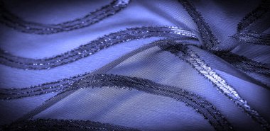 Mavi çizgili ipek kumaş. Safir tonlarında soyut ipek renkler. Kumaşta eski model. Arkaplan dokusu, dekoratif süs