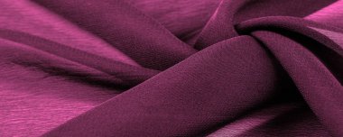 Doku. Geçmişi. Geçmişi. Koyu kırmızı parlak kumaş dokusu, bu soyut bir ipek kumaş arkaplanı.