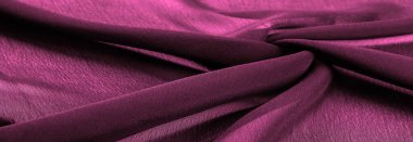 Doku. Geçmişi. Geçmişi. Koyu kırmızı parlak kumaş dokusu, bu soyut bir ipek kumaş arkaplanı.