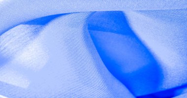 Mavi gök mavisi ipek kumaş. Hoş bir parlaklığı olan çok hafif yapışkan kumaş. Çevrimiçi projelerine zarafet katmak için mükemmel. doku arkaplanı, desen
