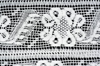 dantel kumaş. Nakışlı kumaş seti. Yakın plan, kurdeleli dantel süsleme, tasarım için işlemeli çiçek örgüsü, projeler, kenar