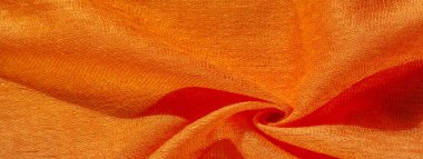 Parlak kırmızı madde. Bu ipek son derece pürüzsüz ve yumuşak, güzel pürüzsüz bir dokusu var. arkaplan deseni