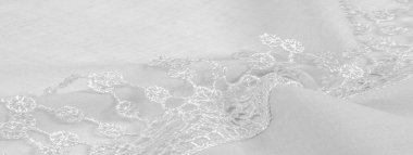 Bahar beyazı ipek ve dantel pelerinler. Gösterişli, zarif beyaz ipek ya da lüks saten soyut bir arkaplan olarak kullanılabilir. Arkaplan dokusu, kartpostal şablonu