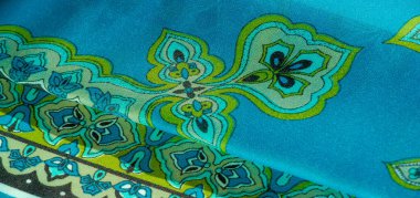 çok renkli ipek kumaş, yeşil arka planda desenler var, kraliyet deseni. Versailles eğilimleri. Jacquard deseni. doku arkaplanı