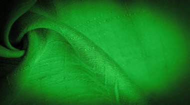 Yeşil kumaş, derin zümrüt ipeği, koyu yeşil dokuma kumaş dokusu arka plan. Dekoratif eşyalar yakın plan. Duvar kağıdı dokusu, arkaplan