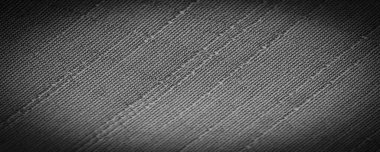 Siyah kumaş, koyu siyah ipek, dokuma kumaş arkaplan. Dekoratif eşyalar yakın plan. Duvar kağıdı dokusu, arkaplan