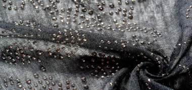 Yapışkan cam taşlı siyah ipek. doku arkaplanı, kartpostal deseni,